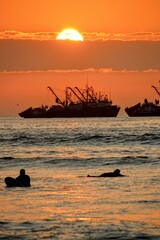 fishing boat at sunset