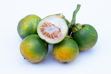 Betel nuts on white background.