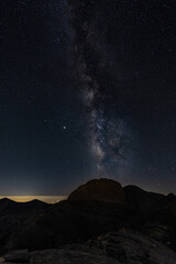 The milkyway galaxy over Olympos mountain, from different angles. Hiking at night to explore wanderfull views.