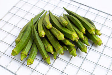 Fresh okra on white background.
