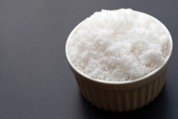White salt on dark background.