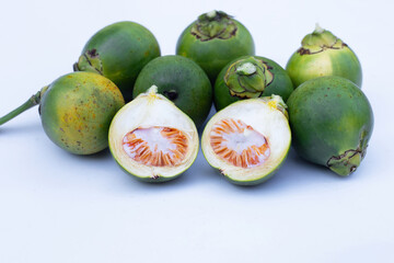 Betel nuts on white background.