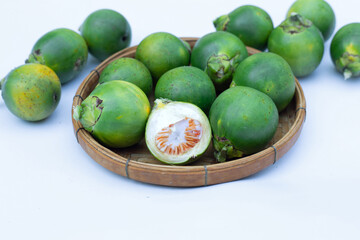 Betel nuts on white background.