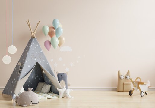 Mock up wall in the children's room with kids tent in light pink color wall background.