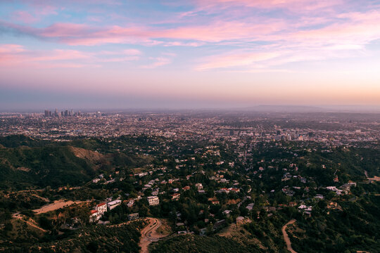 Colorful Sunset over Los Angeles Skyline seen from Griffith Park, California