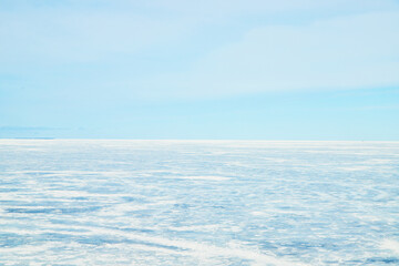 Fototapeta na wymiar View from Mackinaw bridge of frozen lake in winter