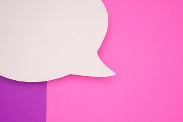 Blank white speech bubble part on a purple and pink background