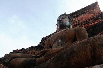 Ancient antiquity architecture and antique ruins building for thai people travelers travel visit respect praying at Si Satchanalai Historical Park and Unesco World Heritage Site in Sukhothai, Thailand