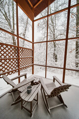 Cabin three season patio after snowstorm