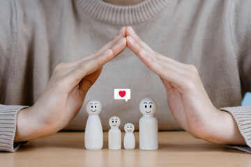 wooden figures of family happy members, Family relationship symbol for family home concept and...