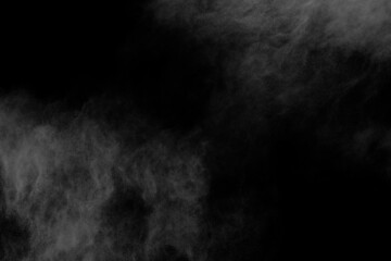 White powder explosion on black background. Colored cloud. Colorful dust explode. Paint Holi.