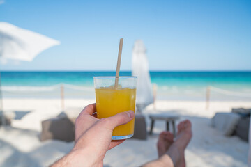 Having drink on the beach
