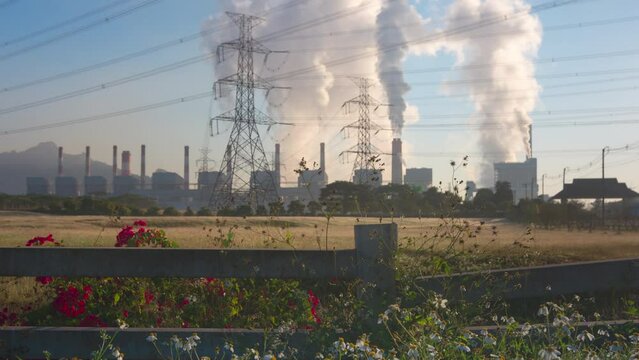 Time lapse video 4K motion, Industrial landscape, coal-fired power plants smoke, industrial pollution causes atmospheric pollution and environmental problems, eco industrial scene.