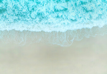 Fototapeta na wymiar Aerial Top view of Blue wave in ocean. Breaking wave background and sun light