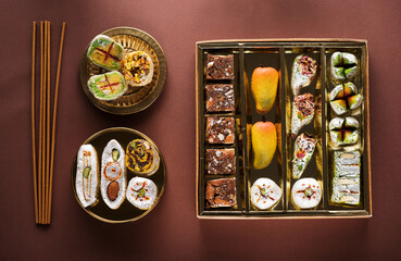 Indian sweets and Mithai for Diwali festival, flat lay, top view