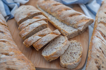 Home made fresh french Baguette loafs on a table