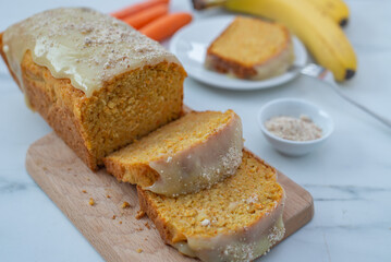 Sweet pumpkin carrot cake with icing yoghurt cream