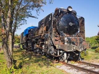 Fototapeta na wymiar 錆びてしまった古い蒸気機関車