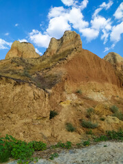 Fototapeta na wymiar Big cave canyon in the Kherson region on the bank of the estuary. Stanislav clay mountains and canyons above Dnipro river bay near the Black sea, Ukraine. sandy hills