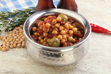 Chickpea beans with dry tomato and olives
