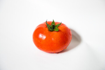 
Red Ripe Tomato Isolated On Background