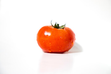 
Red Ripe Tomato Isolated On Background