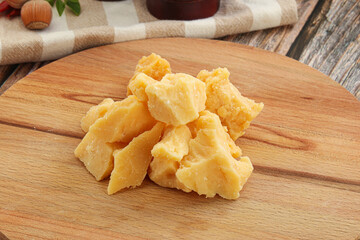 Crushed hard parmesan cheese pieces