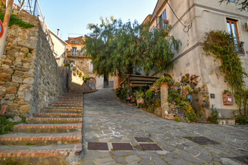 A narrow street among the old stone houses of Altavilla Silentina, town in Salerno province, Italy.	