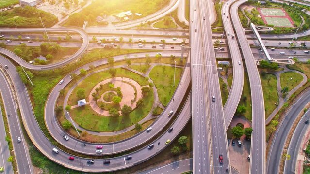 4K UHD : Aerial drone hyperlapse video of elevated toll road junction, Time lapse Aerial view
