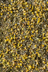 Dried chamomile  tea mix screen filled close up 