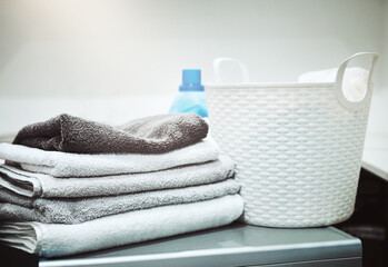 Keeping laundry clean and fresh. Still life shot of linen and a laundry basket on a washing machine.