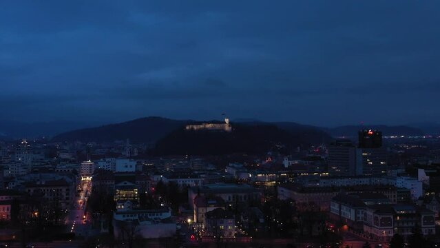 Ljubljana City Center at Night. Slovenia, Europe. Aerial View. Orbiting
