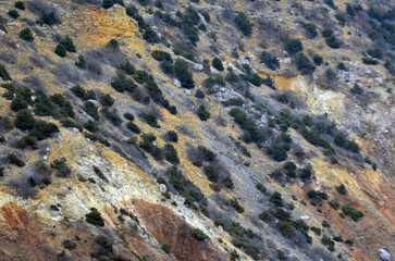Colorful mixture of different soils on the slope