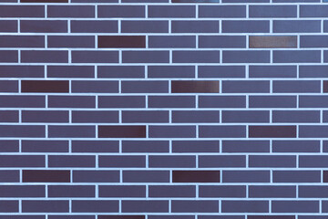 Colorful, vivid and bright purple or lilac background, backdrop or texture ideal brick wall