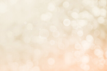 Abstract blurry cream color for background, Bokeh background. Festive defocused white lights...
