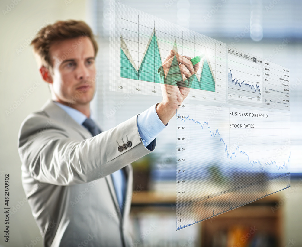 Poster Digital corporate analysis. Cropped shot of a handsome young businessman plotting graphs using a digital interface.