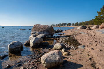 Fototapeta na wymiar View of the shore and Gulf of Finland in spring, Furuvik nature preserve area, Hanko, Finland