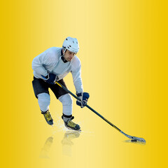 Fototapeta premium Professional ice hockey player hitting puck for winning goal in action on gradient multicolored neon background. Concept of sport competition.