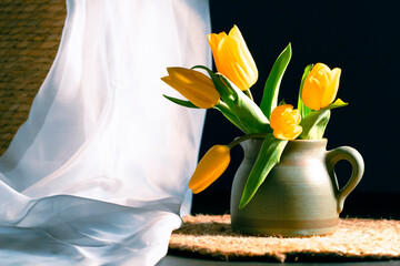 Still life with yellow tulip flower bouquet
