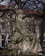 Statue in Place Carnot near Gare Perrache (train station) in the 2nd arrondissement of Lyon, France, February 2022. A woman whose left hand rests on a ridge of the city, carrying a sword in her right  - obrazy, fototapety, plakaty