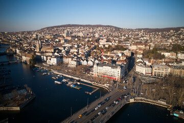 Fototapeta premium Aerial view of City of Zürich with river Limmat, Bellevue Square and lake Zürich on a sunny spring afternoon. Photo taken March 4th, 2022, Zurich, Switzerland.