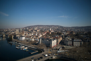 Fototapeta na wymiar Aerial view of City of Zürich with river Limmat, Bellevue Square and lake Zürich on a sunny spring afternoon. Photo taken March 4th, 2022, Zurich, Switzerland.