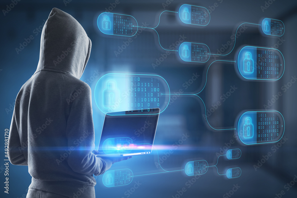 Fototapete Hacker in hoodie using laptop with abstract big data and security nodes on blurry office interior background. Technology, phishing, web safety and programming concept. Double exposure.