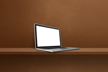 Laptop computer on brown shelf background