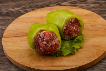 Raw stuffed pepper for cooking