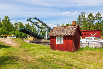 Canal with boats at a open bascule bridge