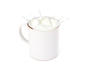 Milk or yogurt splash in white mug isolated on white background.
