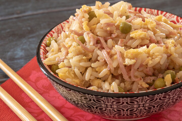 close up view of delicious Asian food. Rice with meat and peas