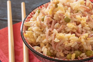 close up view of delicious Asian food. Rice with meat and peas