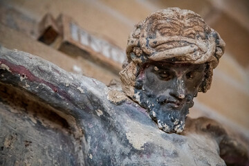 Fototapeta na wymiar the crucifixion of jesus in stone sculpture